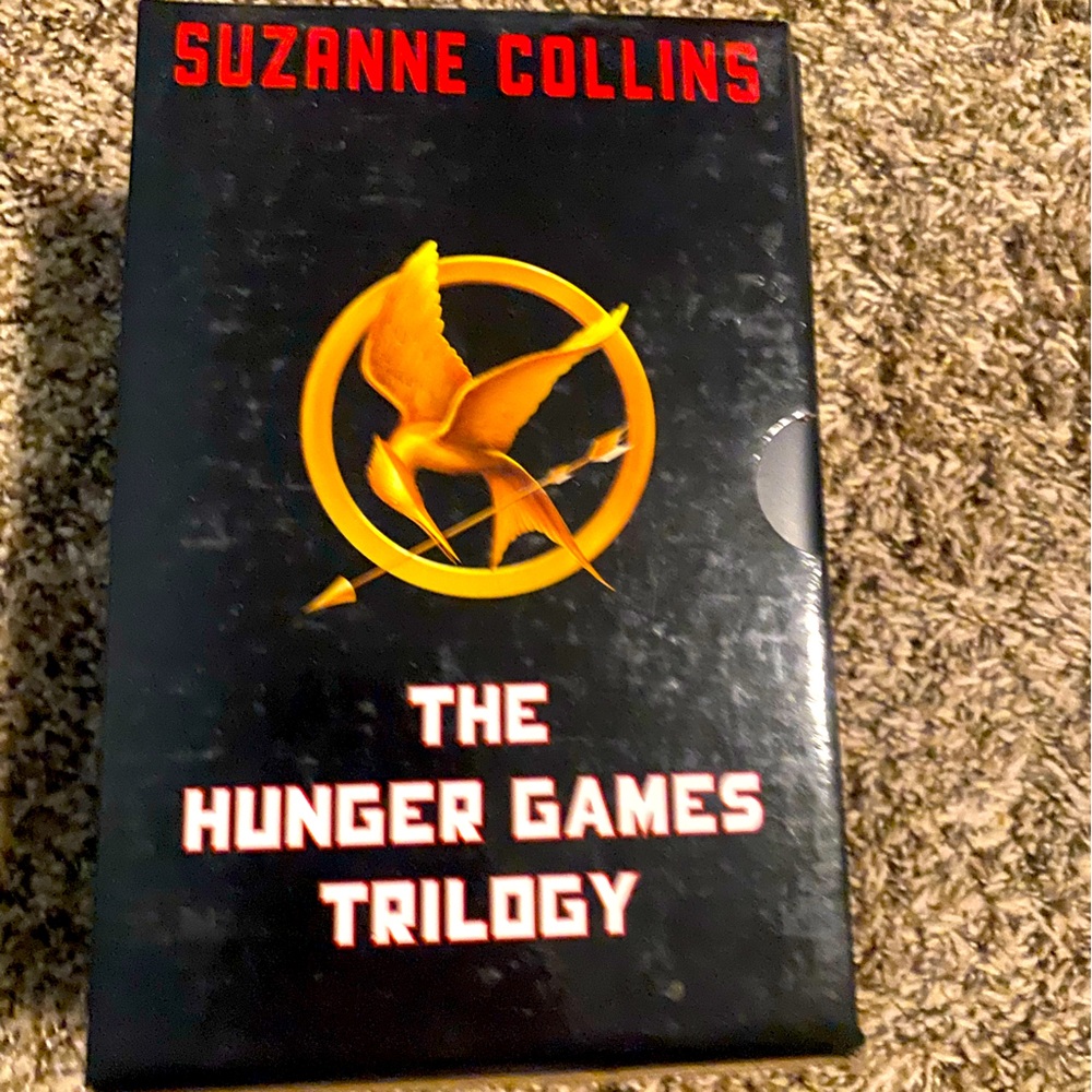 The hunger games trilogy by Suzanne Collins